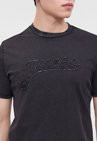 GUESS T-Shirt in Schwarz