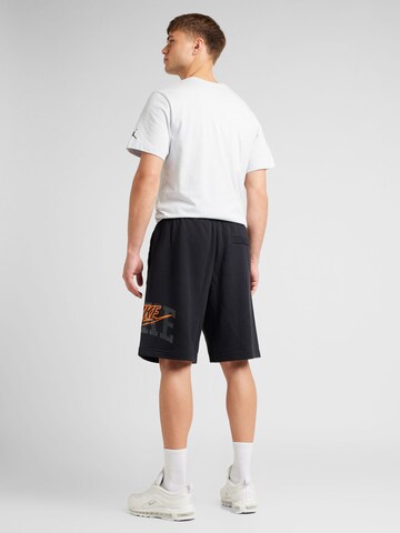 Nike Sportswear Loose fit Sports trousers 'CLUB' in Black