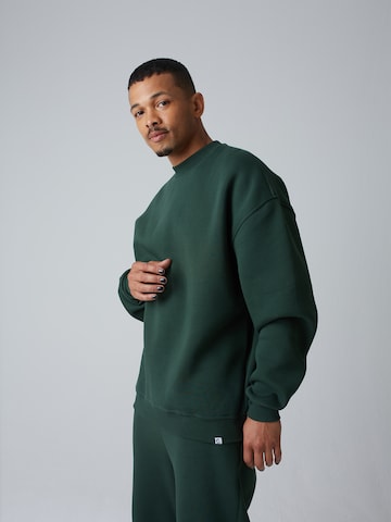 Sweat-shirt 'Dave' ABOUT YOU x Benny Cristo en vert : devant