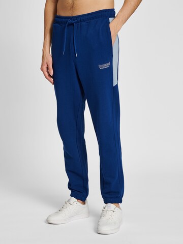 Hummel Tapered Pants in Blue: front