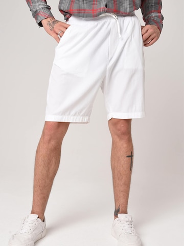 Antioch Trousers in White: front