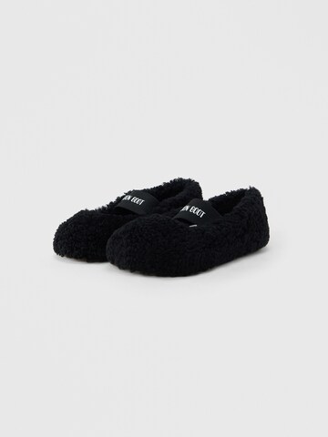 Pantoufle MOON BOOT en noir