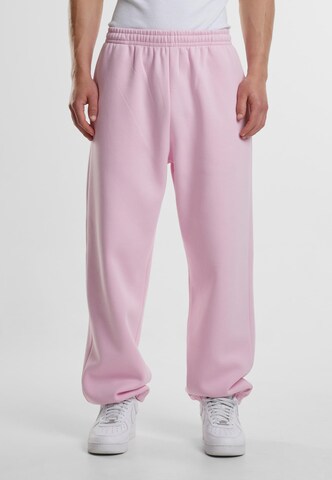 Effilé Pantalon 'Fluffy' Urban Classics en rose