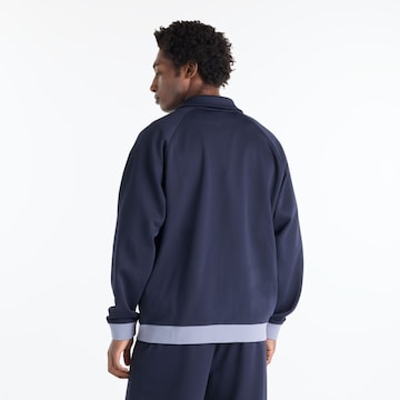 new balance - Chaqueta deportiva 'Sport Legacy' en azul