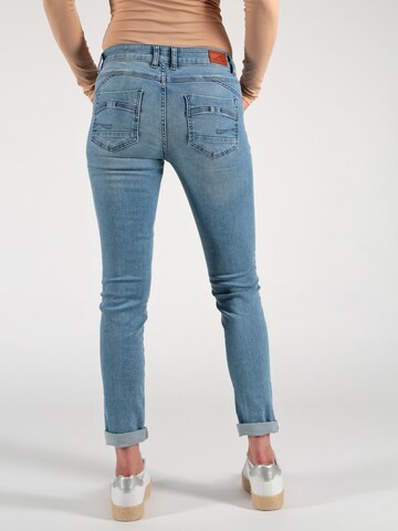 Miracle of Denim Tapered Jeans in Blue