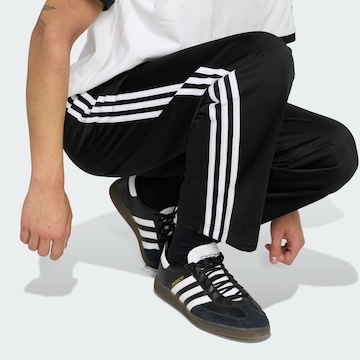 Loosefit Pantalon 'Firebird' ADIDAS ORIGINALS en noir