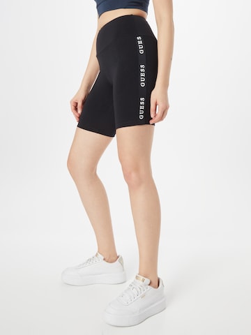 Skinny Pantalon de sport GUESS en noir : devant