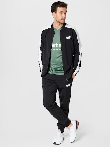PUMA Tracksuit in Black ABOUT