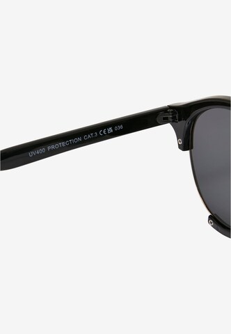 Lunettes de soleil 'Coral Bay' Urban Classics en noir