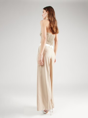 REMAIN Wide leg Veckad byxa i beige