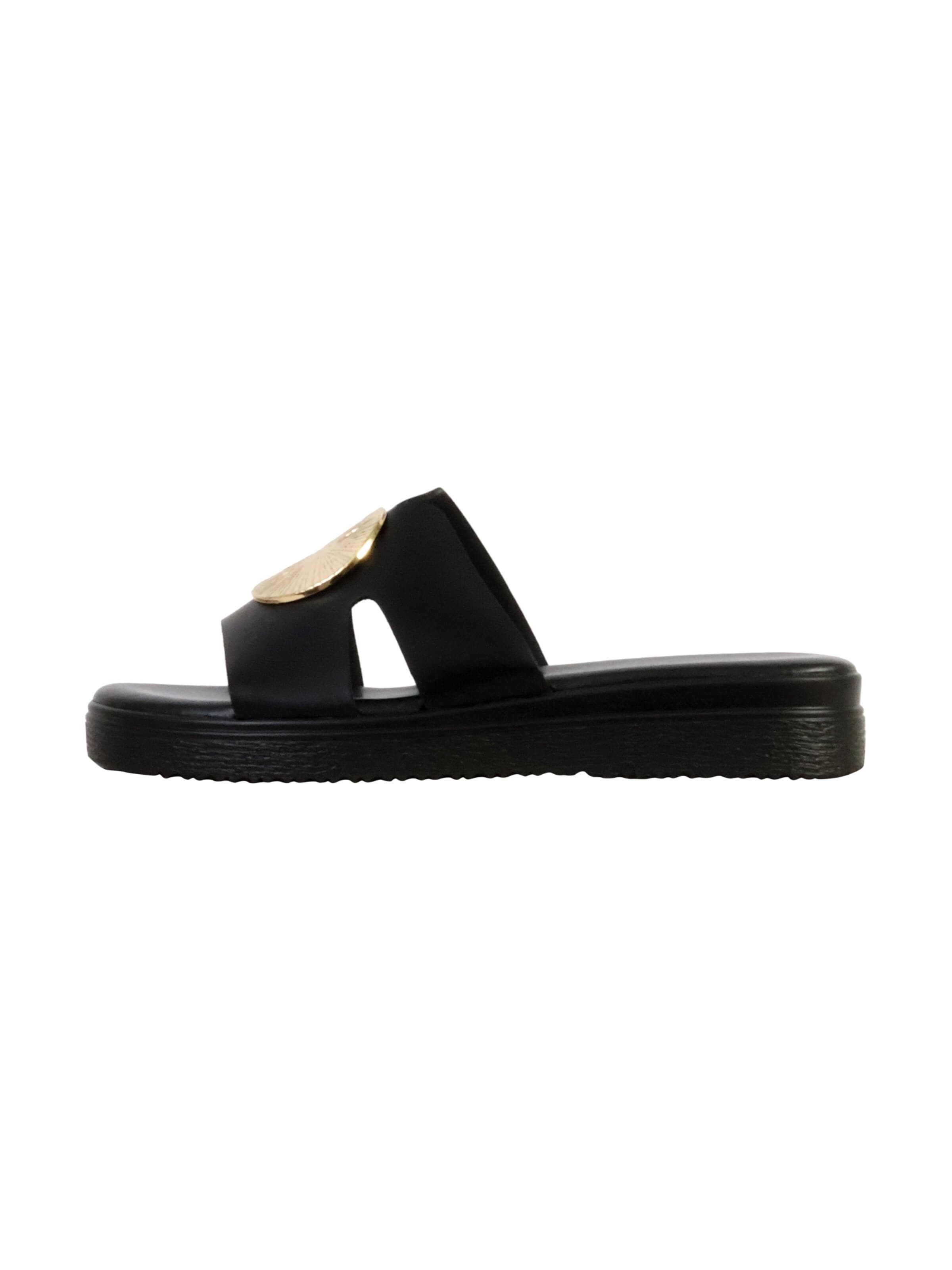 The Divine Factory Sandals in Black: front