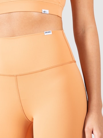 Smilodox Skinny Workout Pants 'Caprice' in Orange