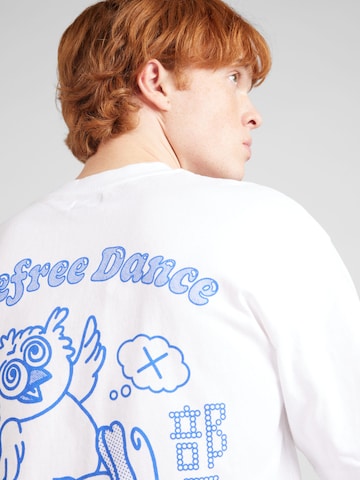 T-Shirt 'Carefree Dance Club' EDWIN en blanc
