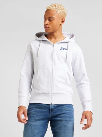 Veste de survêtement Superdry en gris : devant