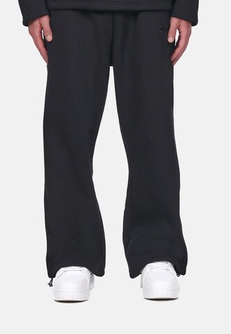 Dropsize Loose fit Trousers in Black: front