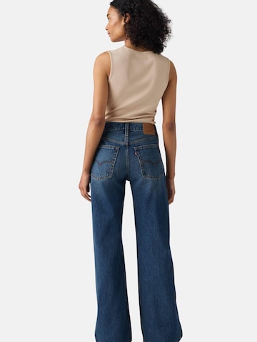 LEVI'S ® Lużny krój Jeansy 'LEVI'S LOOSE BOOT PHOENIX RISING PANTALONE' w kolorze niebieski