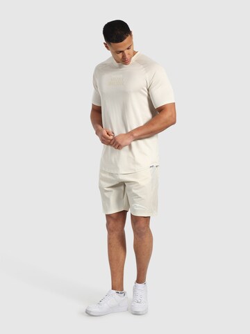 Regular Pantalon de sport ' Powerfit Triple ' Smilodox en beige