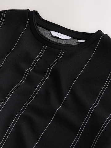 T-Shirt Next en noir