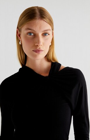 T-shirt Scalpers en noir : devant
