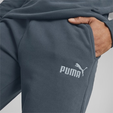 PUMA Tapered Sportbroek in Blauw