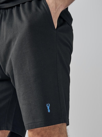 Pantaloncini da pigiama di Next in nero