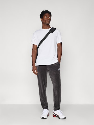 PUMA Regular Broek 'ESS' in Zwart
