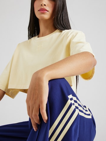 ADIDAS ORIGINALS Shirt 'ESS+' in Yellow