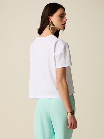 Haut oltre en blanc
