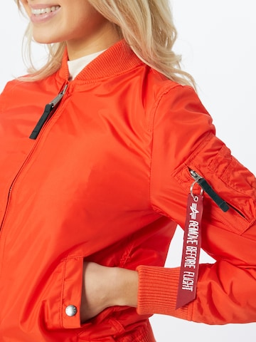 ALPHA INDUSTRIES Between-Season Jacket 'MA-1 TT WMN' in Red