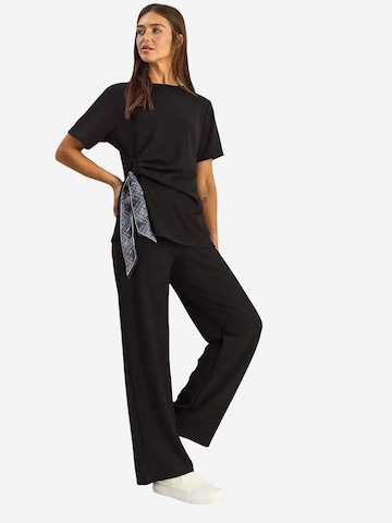 Pantalons de tailleur Bianco Lucci en noir