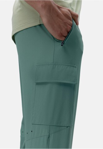 Born Living Yoga Tapered Weatherproof pants 'Minho' in Green