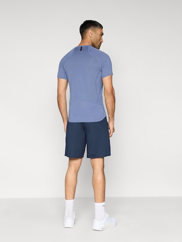 NIKE Свободный крой Спортивные штаны 'FLEX' в Синий