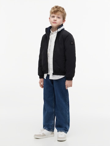 TOMMY HILFIGER Tussenjas 'Heritage Essential' in Zwart