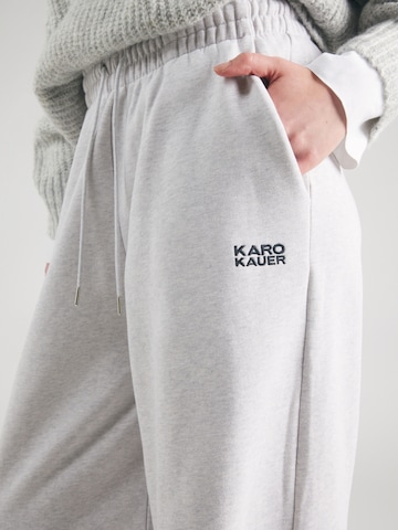 Karo Kauer Široke hlačnice Hlače | siva barva