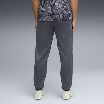 PUMA Tapered Sportbroek 'Manchester City King Anthem' in Grijs
