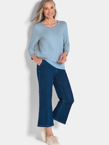 Goldner Pullover in Blau