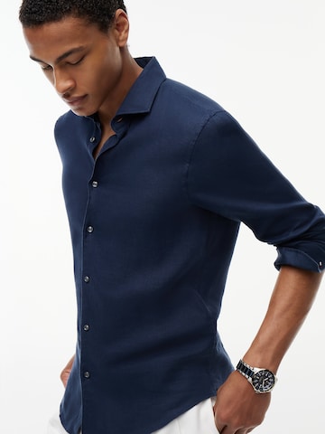 Coupe slim Chemise business 'New York' TOMMY HILFIGER en bleu