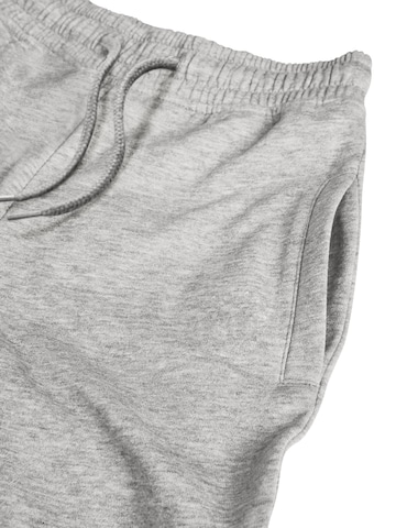Next Tapered Housut värissä harmaa