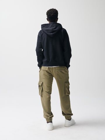 Sweat NoWear en noir : derrière