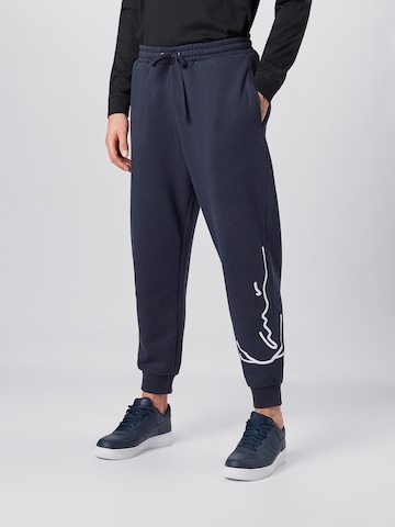 Karl Kani Tapered Trousers 'Signature' in Blue: front