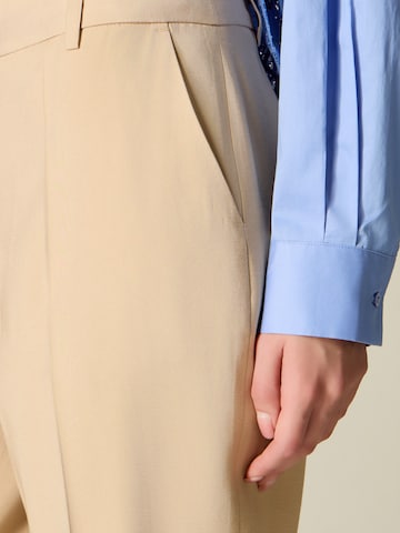 Flared Pantaloni di oltre in beige