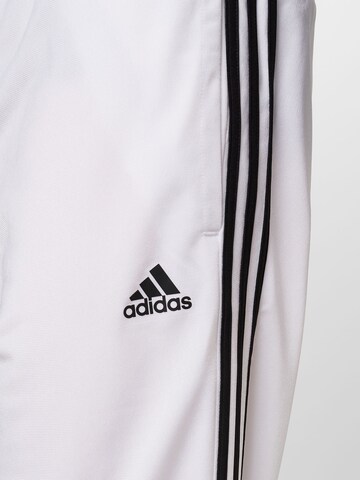 ADIDAS SPORTSWEAR Tapered Sports trousers 'Essentials Warm-Up' in White