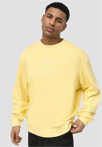 Sweat-shirt Karl Kani en jaune : devant