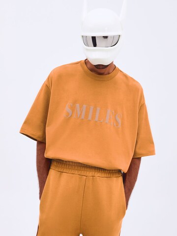 T-Shirt 'Kalle' Smiles en orange : devant