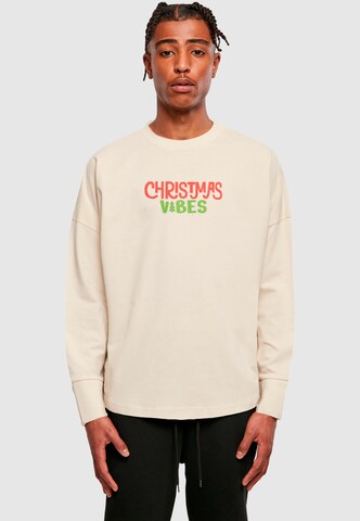 T-Shirt 'Christmas Vibes' Merchcode en beige : devant