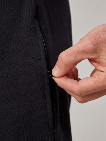 SNOCKS Tapered Functionele broek in Zwart