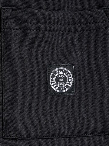 SOMETIME SOON Tapered Trousers 'Dimas' in Black