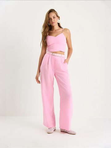Completo pantalone di Bianco Lucci in rosa