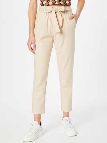 In The Style Regular Trousers in Beige: front