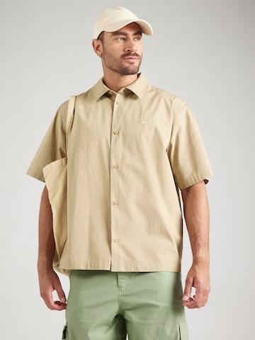 Fit confort Chemise 'CLUB' Nike Sportswear en beige : devant